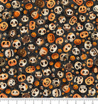 A Haunting We Will Go Skull & Pumpkin Toss 31947-J with inch ruler for scale